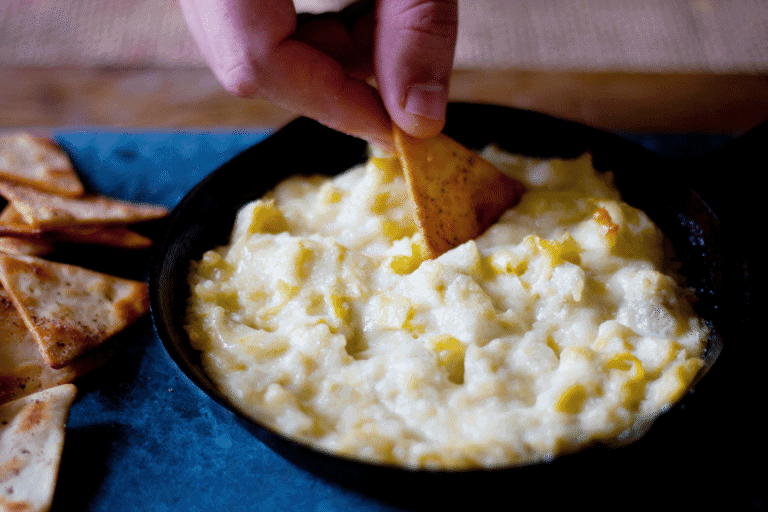 Hot-Artichoke-Dip-served-with-pita-crackers.-A-delicious-and-easy-to-make-appetizer-with-only-4-ingredients.-cupcakesandcrinoline.com_.jpg