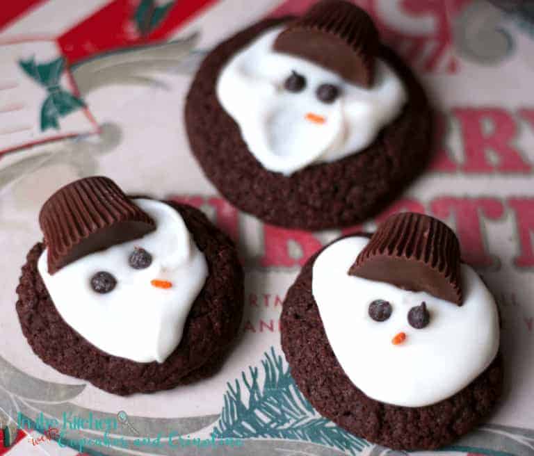 Chocolate Melting Snowman Cookies - an easy-to-make holiday favorite. Get the recipe at www.cupcakesandcrinoline
