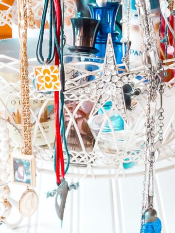 French metal basket used to organizer jewelry