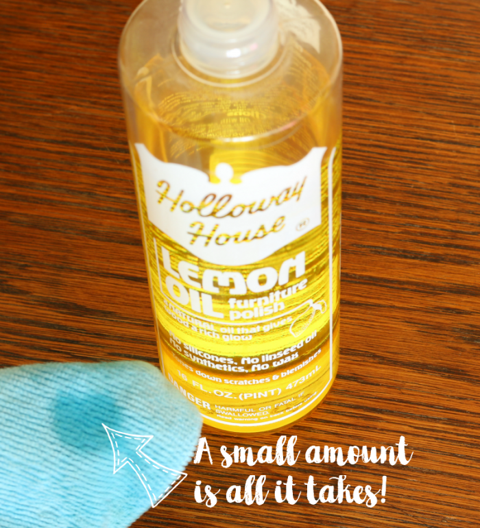 Small amount of lemon oil on a miicrofiber cloth- how to remove water stains from wood