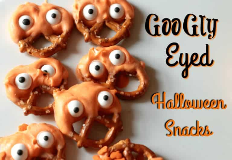 Googly eyed Halloween Snacks - candy coated pretzels and Halloween Oreos www.cupcakesandcrinoline.com
