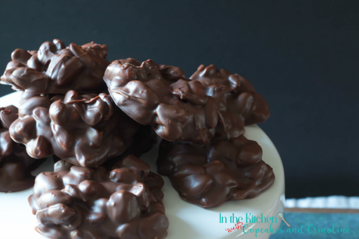 Homemade Slow Cooker Candy. These chocolate-covered peanut clusters taste delicious, can be made up to a month ahead of time and frozen and are perfect for gift giving and holiday entertaining. Get the recipe at www.cupcakesandcrinoline.com