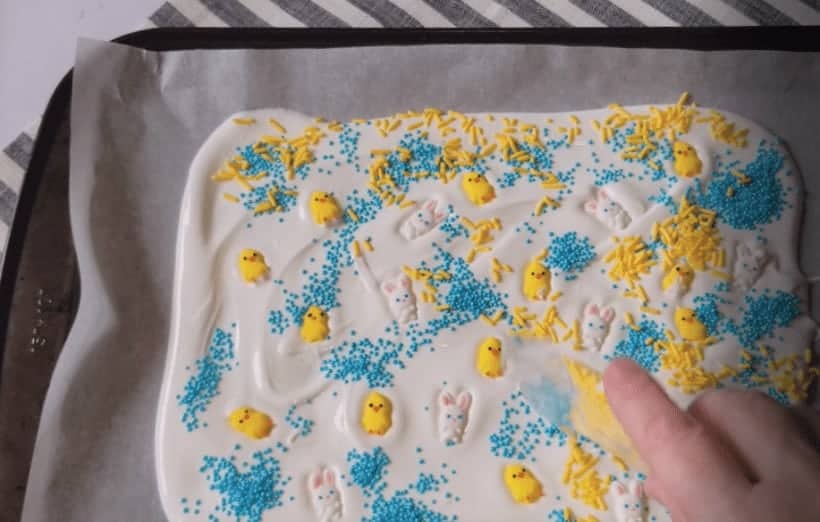 Add candy sprinkles to bark 