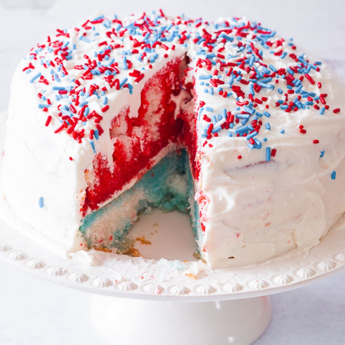 Homemade chocolate cake decorated with fresh strawberries on glass plate on  blue color background with copy space Stock Photo - Alamy