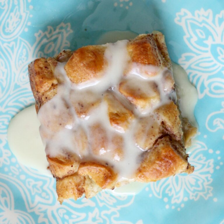 Overhead view of a square piece from a make ahead cinnamon roll casserole that was made with store bought tubes of cinnamon rolls