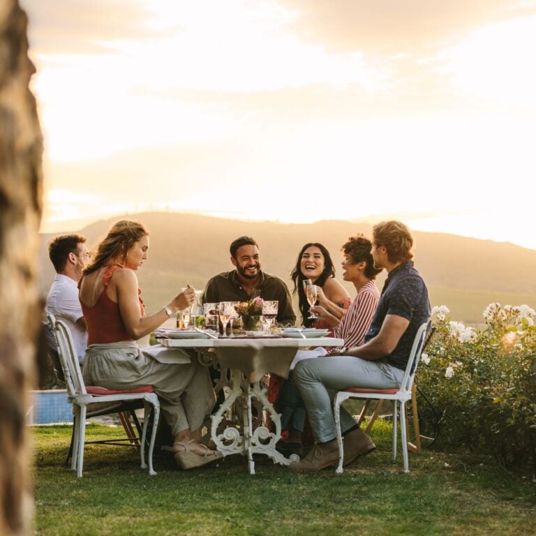 Outdoor dinner party with friends and a beautiful view of the napa valley