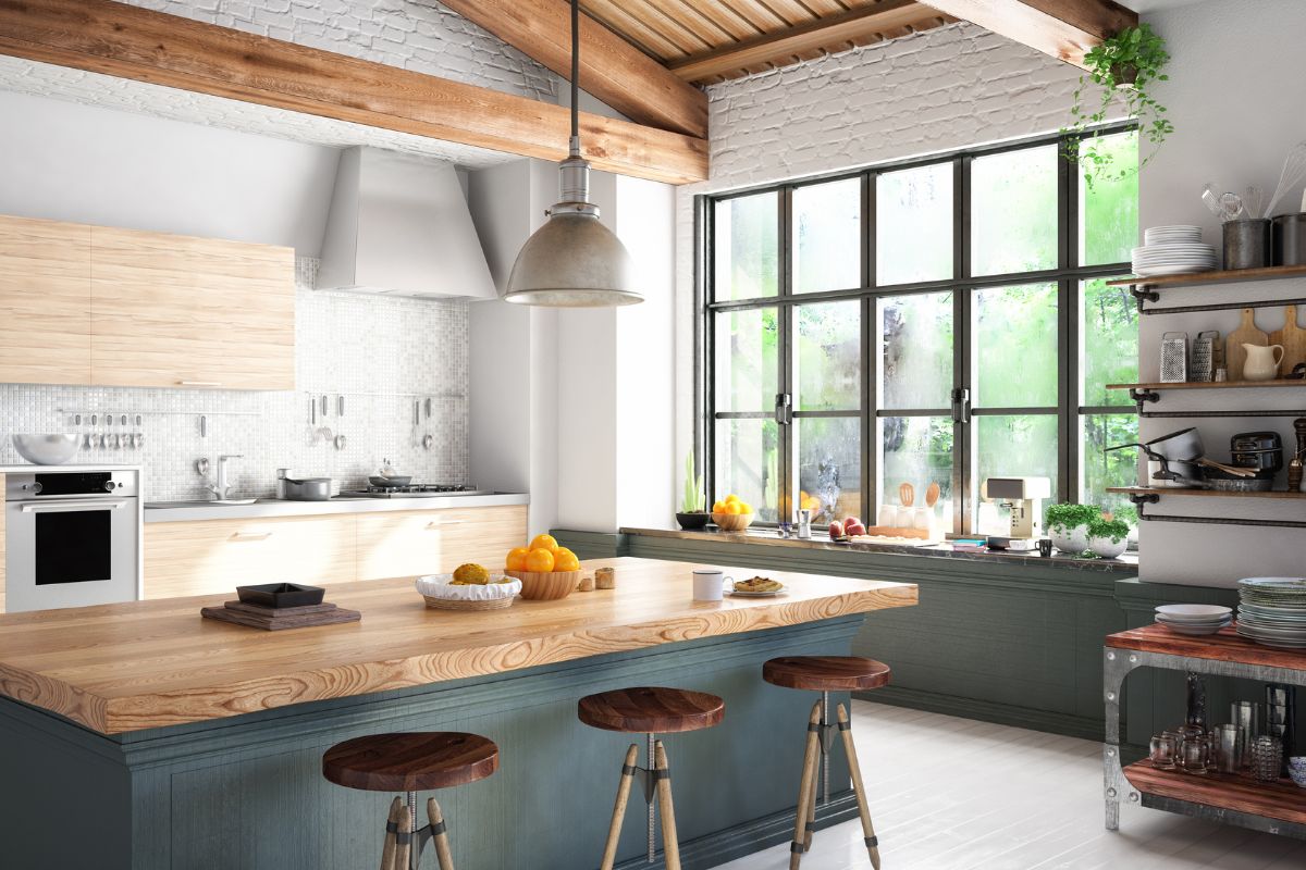 A bright and airy kitchen with large industrial-style windows allowing natural light to flood the space, enhancing both interior and exterior appeal.