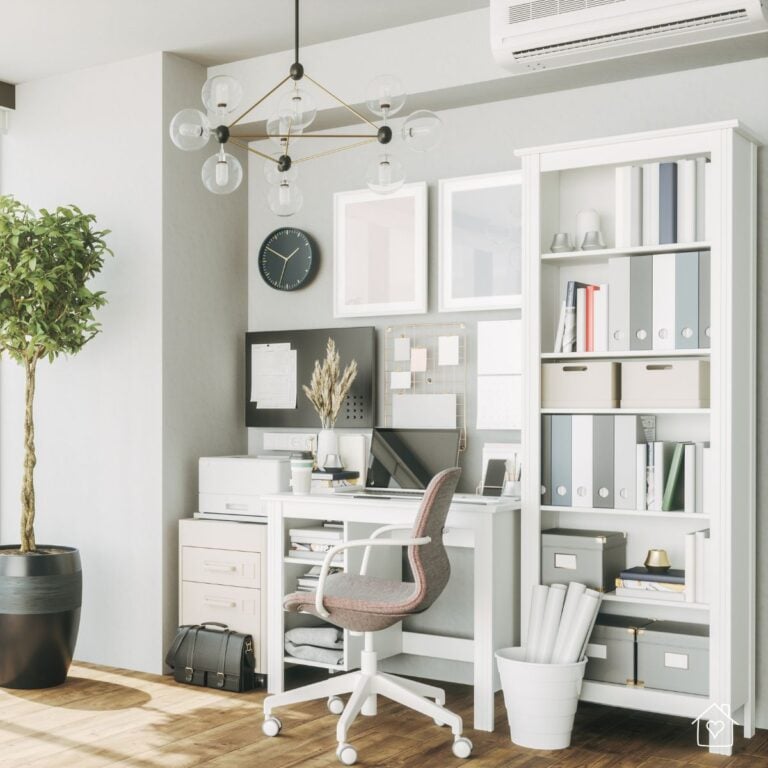 A bright and well-organized home office featuring a white desk, sleek shelving, neutral-toned storage boxes, and a modern chandelier — perfect inspiration for turning a former bedroom into a chic and functional workspace.