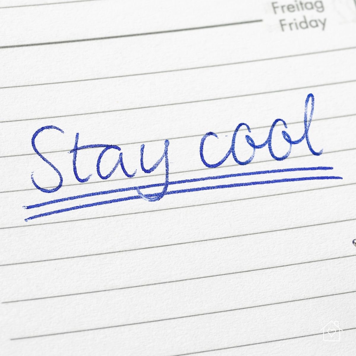 Handwritten note that says “Stay cool” underlined in blue ink, symbolizing the importance of keeping your home comfortable during AC issues.