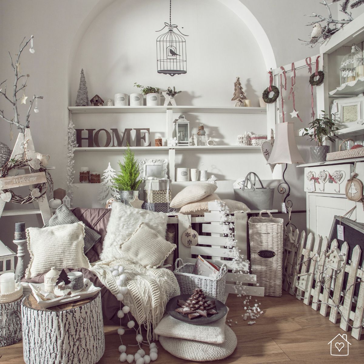 Cozy home store corner filled with rustic decor, soft textiles, wooden shelves, and charming seasonal decorations.