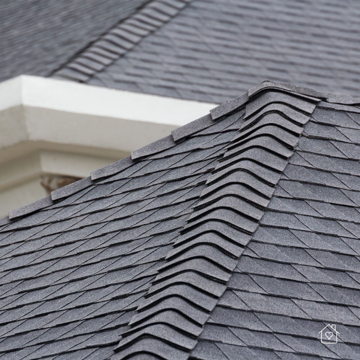 Close view of layered architectural shingle ridge cap for added weather protection.