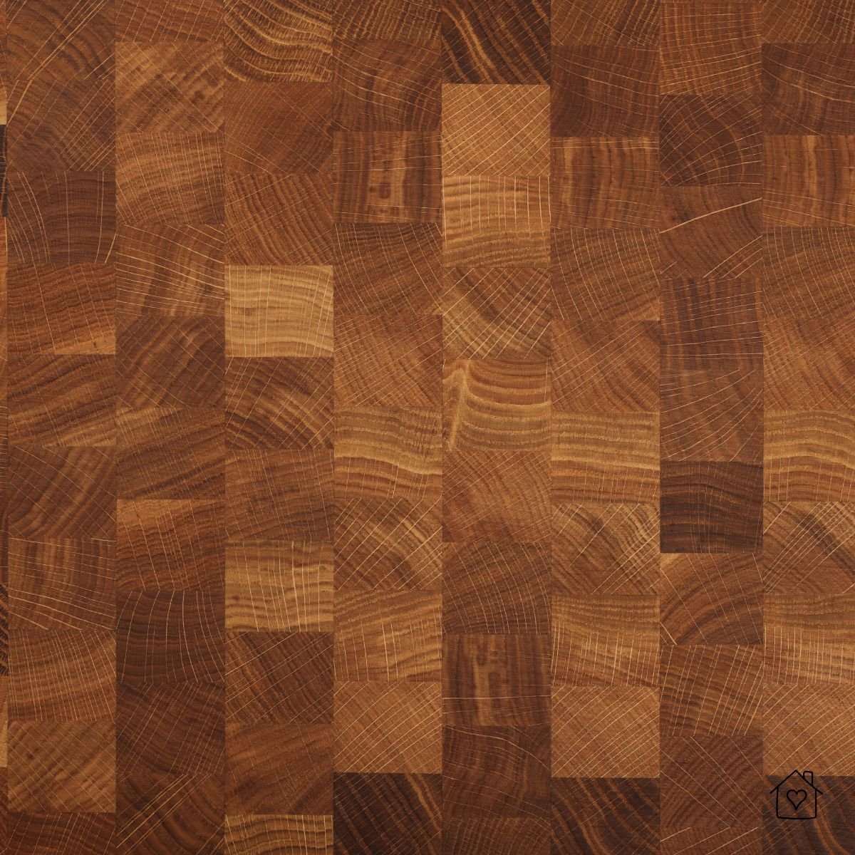 Close-up of end-grain walnut squares with visible growth rings and tight joints.