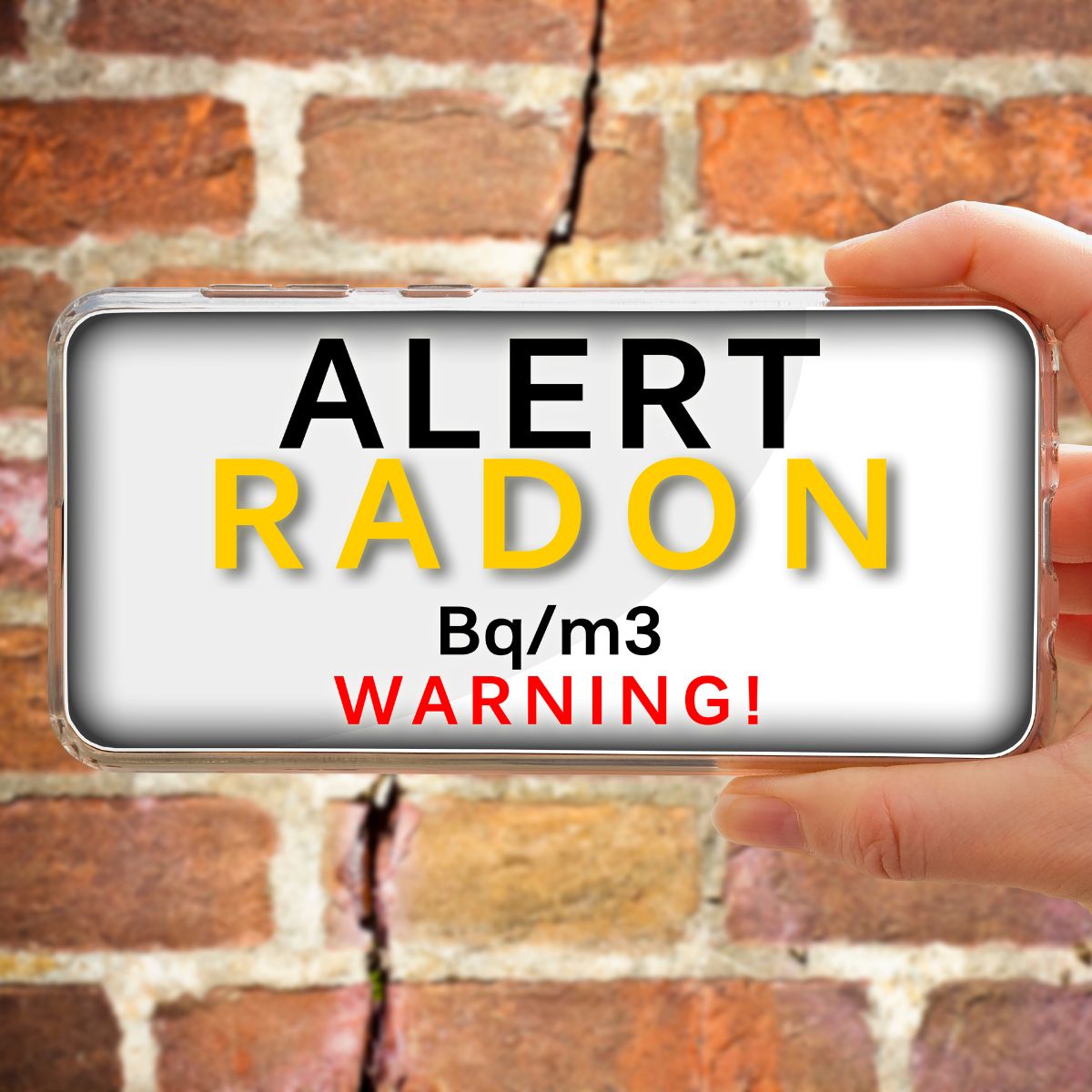 Hand holding a phone that reads “ALERT RADON Bq/m³ WARNING!” in front of a cracked brick wall, indicating elevated radon levels.