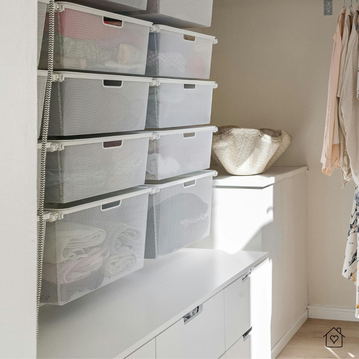 Minimal closet with mesh drawers and hanging clothes, illustrating space gained when seasonal items are stored in an outdoor shed.