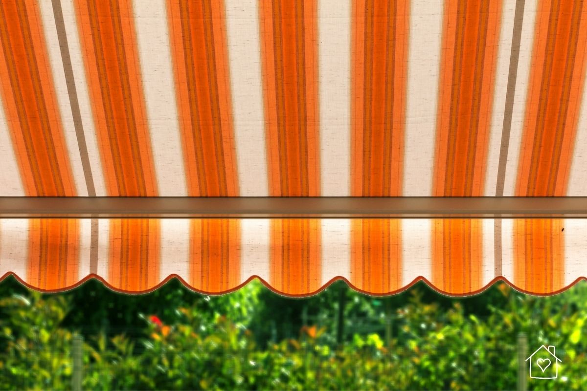 Close-up of orange striped retractable awning fabric highlighting weave and color