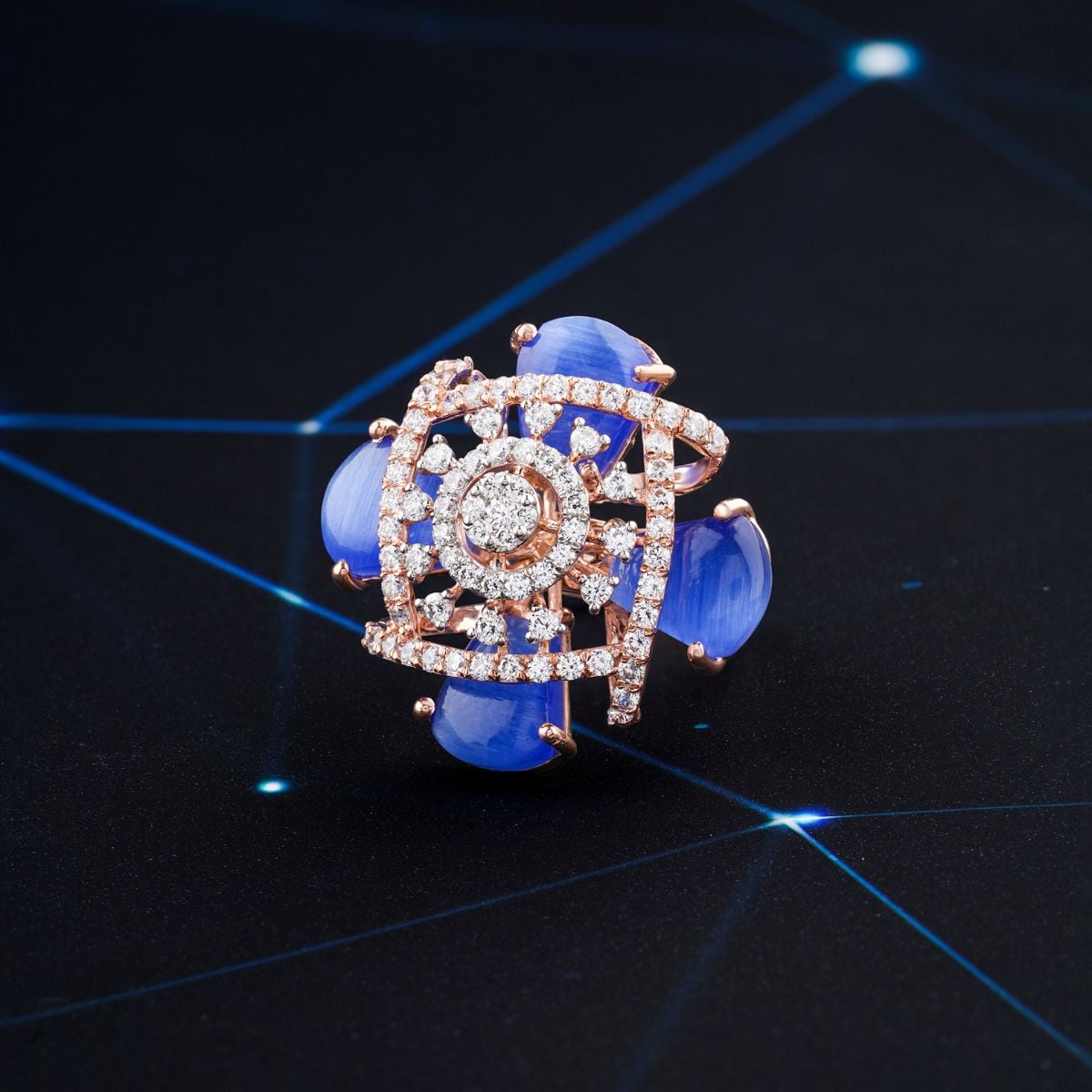 Sapphire and diamond ring on dark backdrop—timeless fine jewelry built to last and pass down.