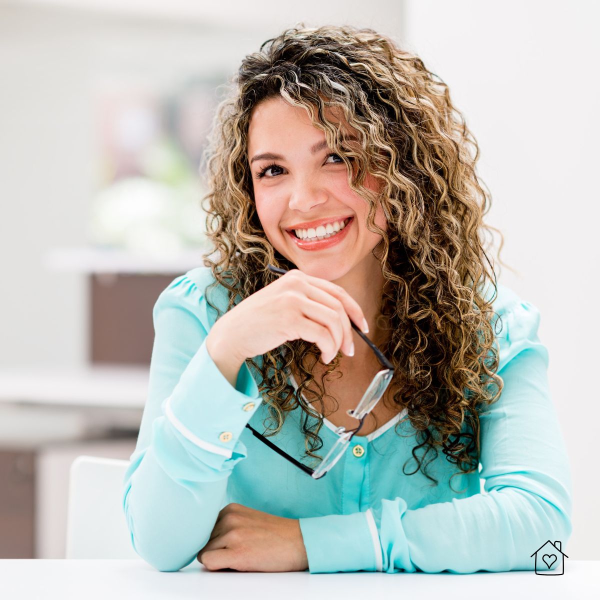 Smiling professional looking energized after comfortable work session