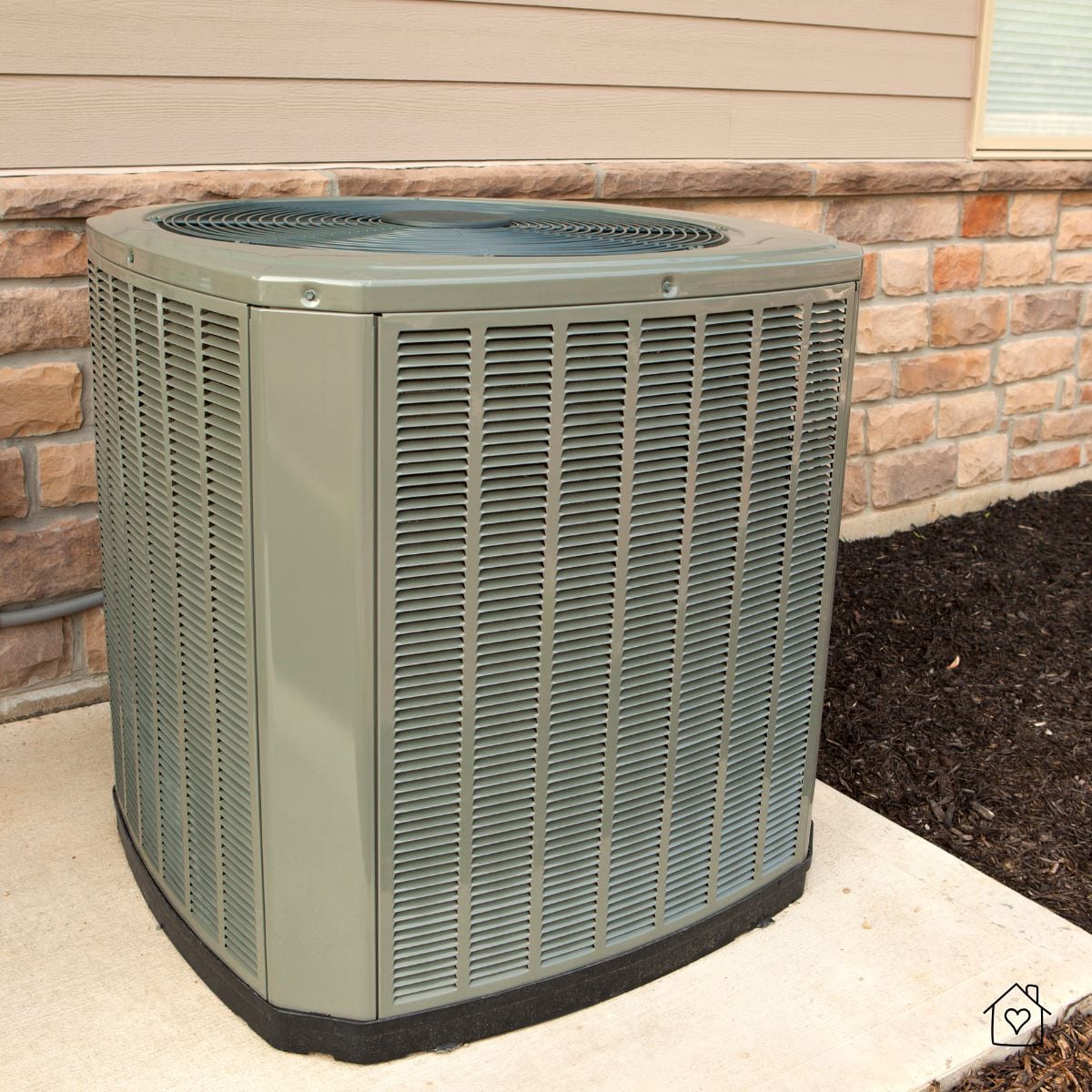 Newly installed central air conditioning unit outside a Birmingham home, designed to handle Alabama&rsquo;s heat and humidity