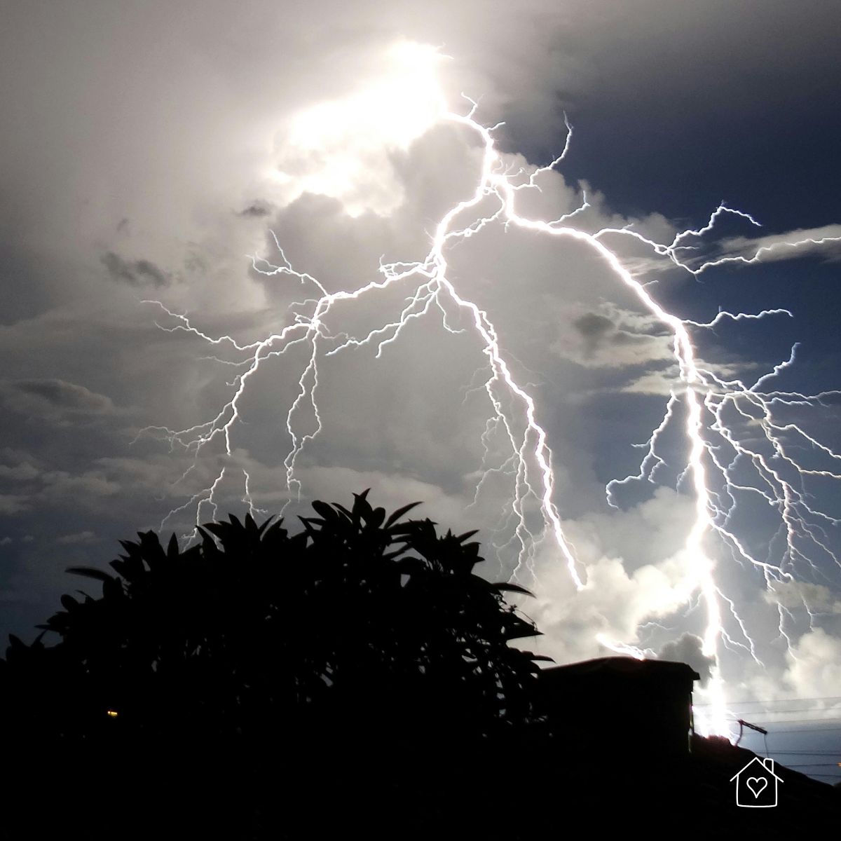 Lightning storm in the sky, a common cause of power outages and electrical disruptions