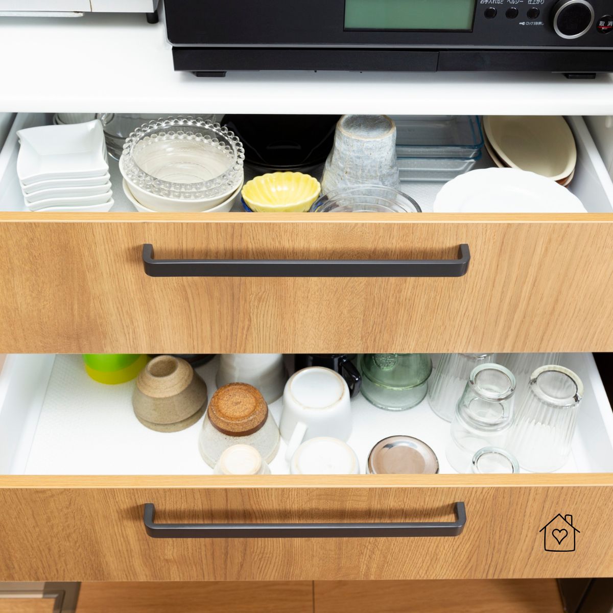 Deep drawer storage for breakables&mdash;no more reaching overhead; everything slides into view.