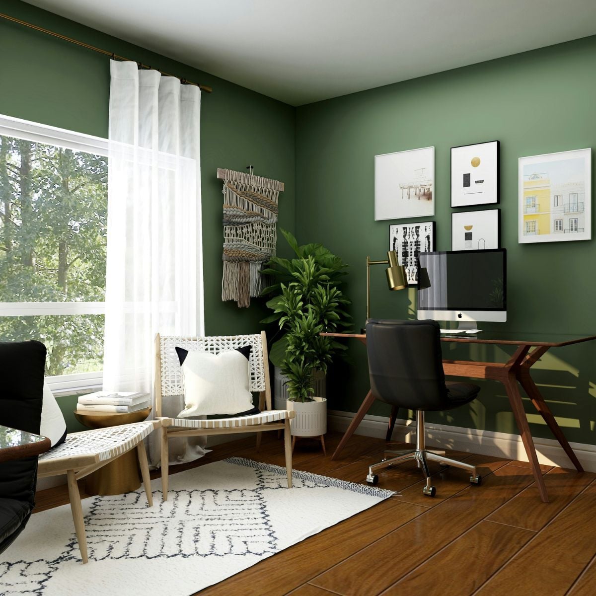 Mindful home office with deep green walls, wooden desk, black office chair, white accent chairs, indoor plants, wall art, and soft natural light