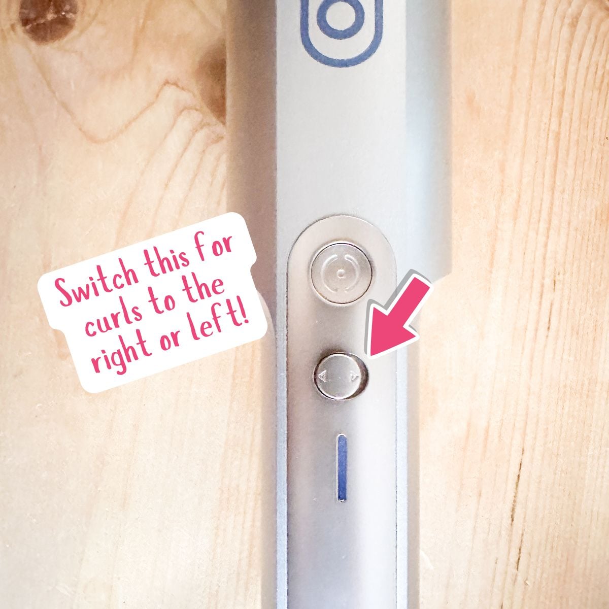 TYMO CurlPro curling iron direction button that controls whether curls go left or right