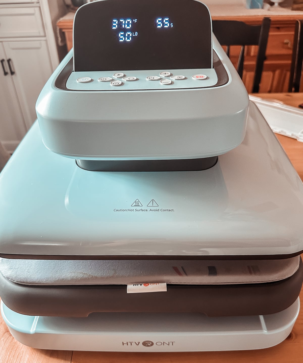 HTVRont Auto Heat Press 2 heating up for a sublimation scarf, display reading 370 degrees at 50 pounds of pressure