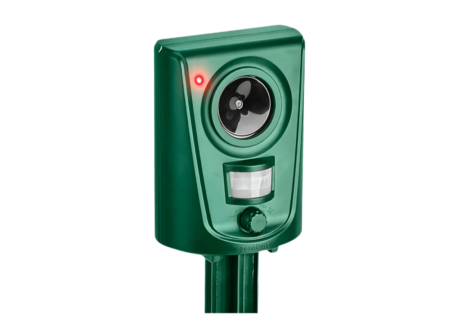 ZeroCat-ultrasonic-cat-repellent ZeroCat solar-free ultrasonic cat repellent stake with motion sensor and red activation light, shown outdoors