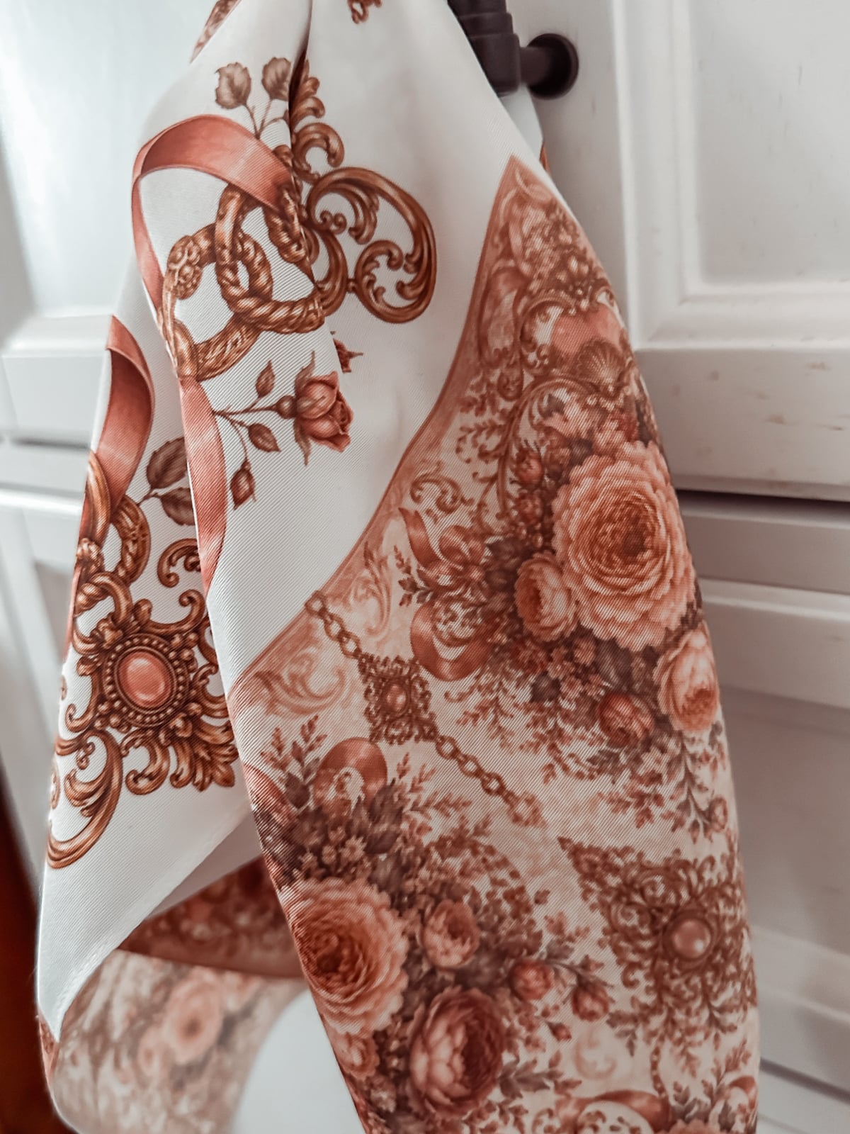 Detail of the baroque florals and gold medallion on the finished sublimation scarf